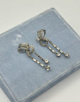 Art deco bow clip-on earrings in silver, 1930