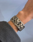 Flowery engraved bangle bracelet