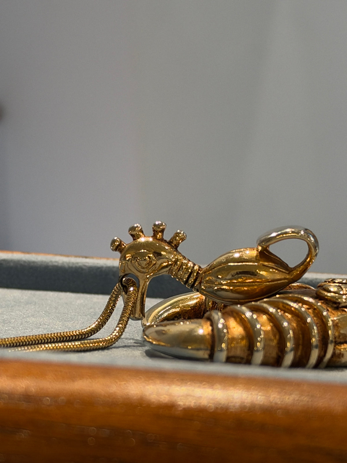 Golden taurus face necklace