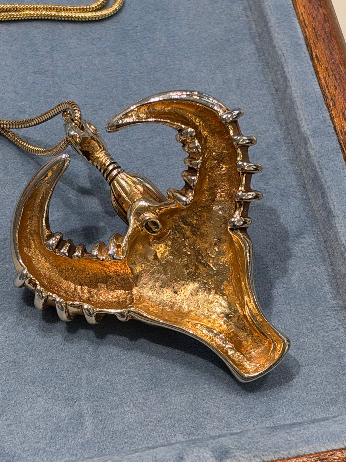Golden taurus face necklace