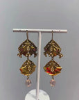 Openwork golden and pink dangly earrings