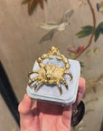 Golden crab pendant