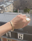 Silver and gold-plated bangle