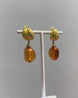 Orange and golden small dangly clips