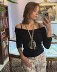 Accumulate pearls and fine stones shell necklace