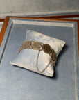 Silver-plated coin bracelet featuring the effigy of Queen Victoria